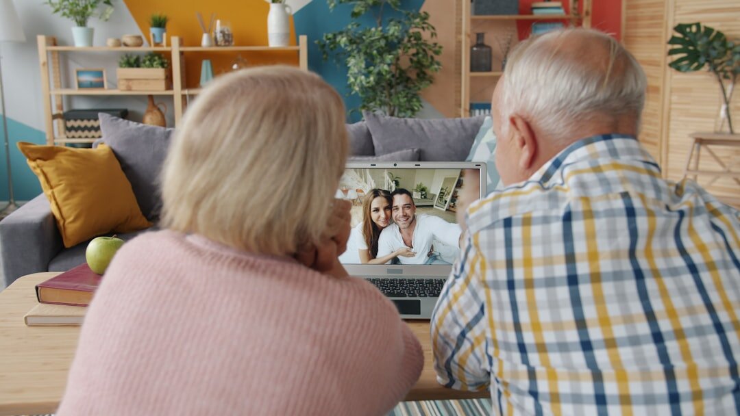 Legal advisor consulting elderly couple about estate planning documents